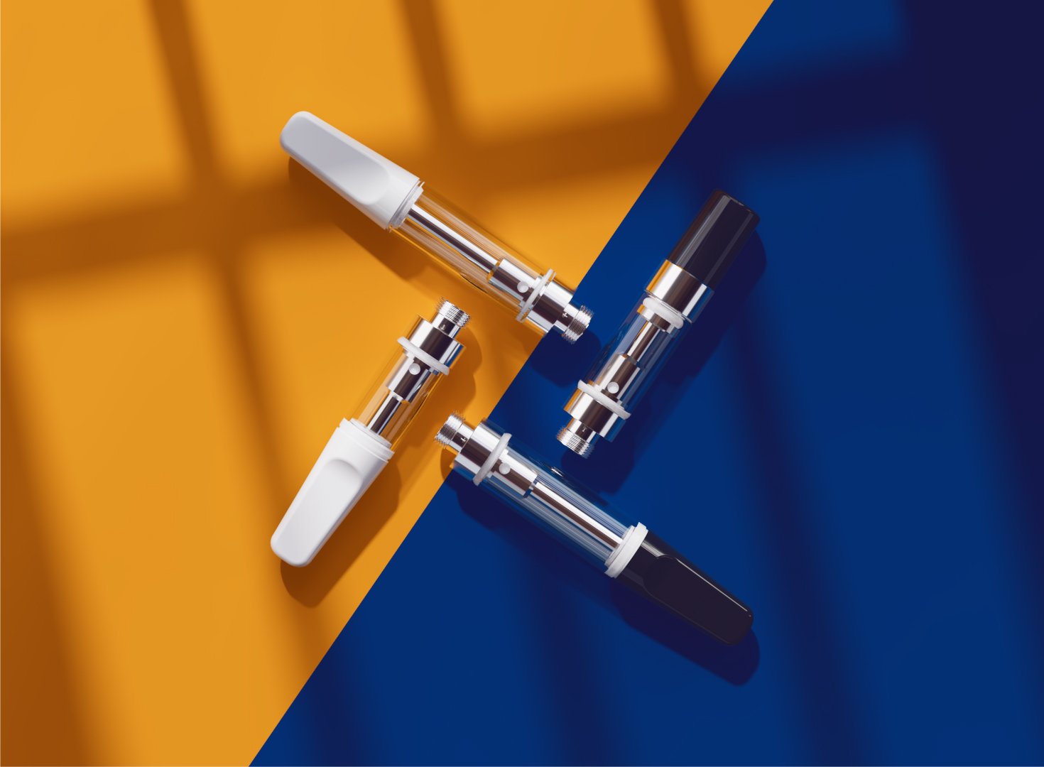 Custom 510 thread ceramic vape cartridges by µKERA with black and white mouthpieces, featuring advanced micro-vaporization heating technology for THC and CBD oils.