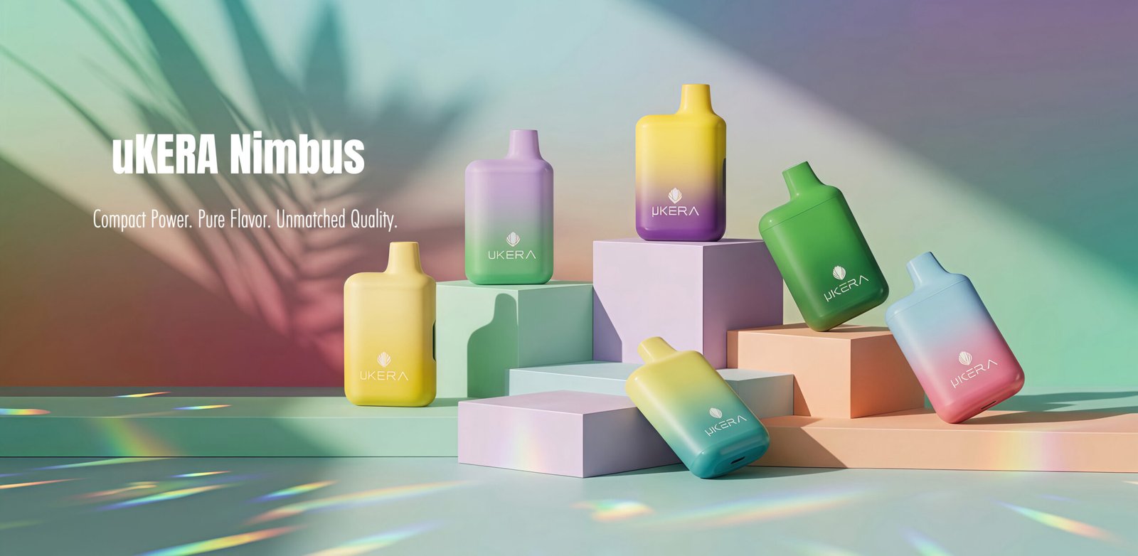 UKERA Nimbus vape devices in yellow, purple, green, and blue gradient finishes featuring ergonomic mouthpieces and clear side oil windows.