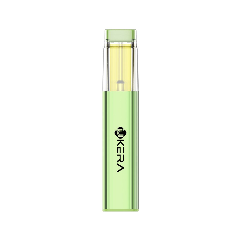 Three uKERA XP Pro 2g disposable vape pens in metallic green, olive, and navy blue standing upright on geometric blocks.