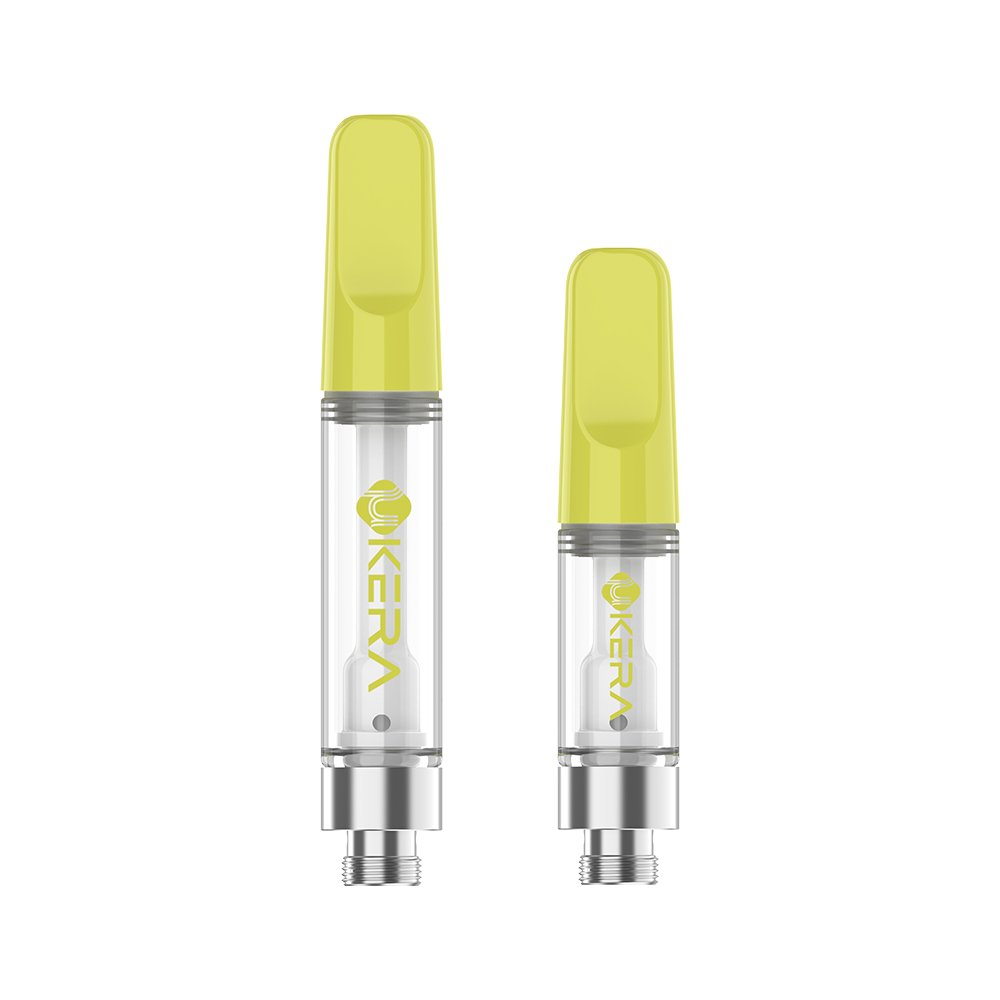 lt Text: Yellow Ukera G181 Luma ceramic vape hardware in 1.0mL and 0.5mL sizes, featuring a standard 510 thread metal base and pure ceramic center post for reliable oil vaporization.